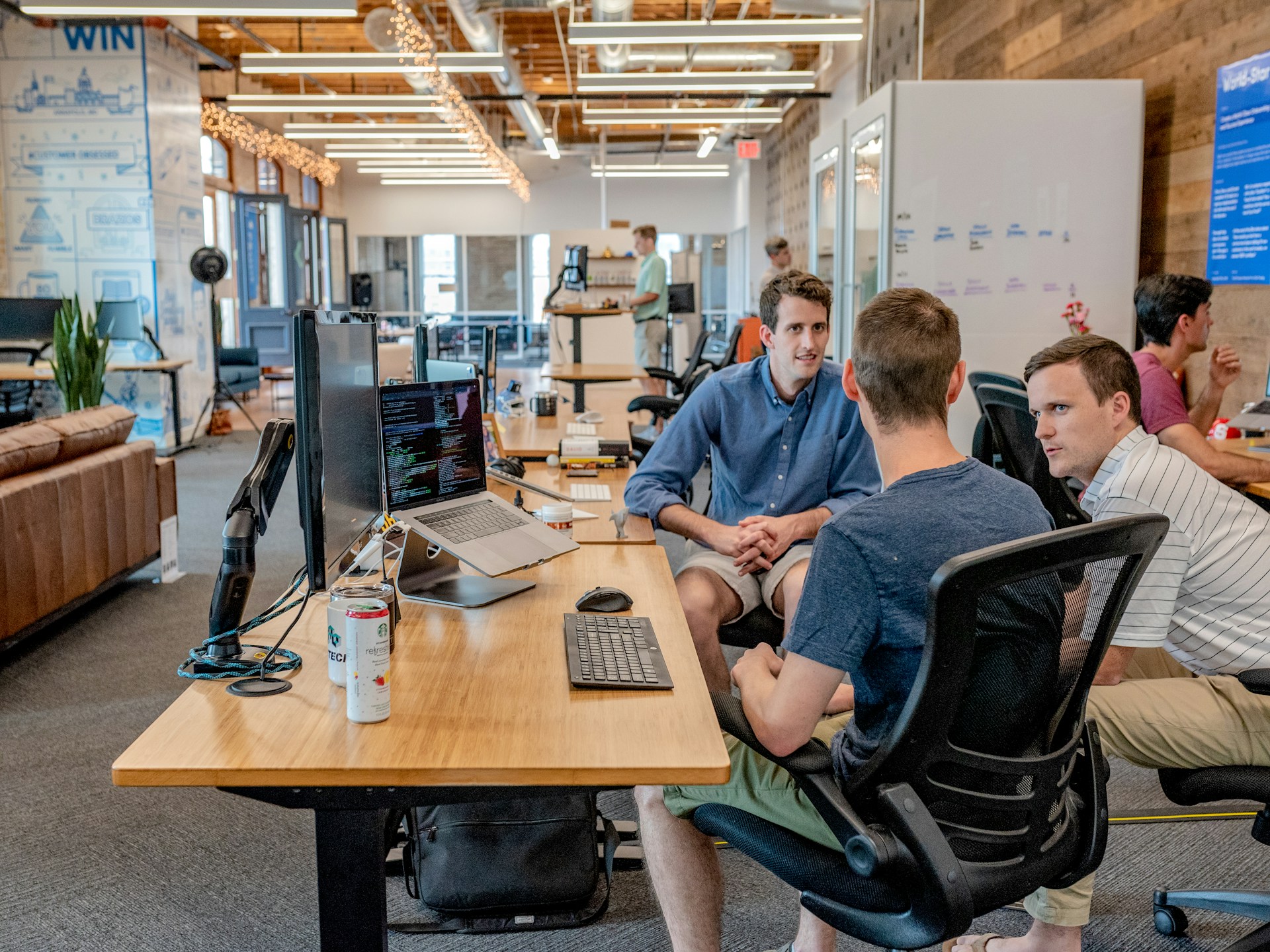 Client leadership team reviewing AI governance documents with LearnShift advisors